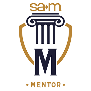 SAM Mentor badge featuring a gold and navy shield with a classical column at the center. The letter "M" is displayed prominently below the column, representing the Mentor giving level in the Pillars of Progress program. The SAM logo appears above the column.