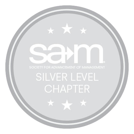 Silver Level Chapter badge from the Society for Advancement of Management. The circular badge has a light silver background with the SAM logo at the center, surrounded by stars, and the text 'Silver Level Chapter' displayed below.